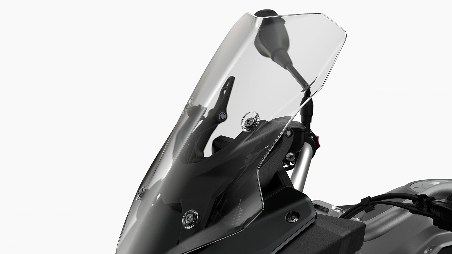 We see the windshield of the BMW F 900 XR.
