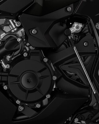 We see a close-up of the engine.