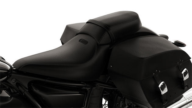 We see the divided seat with pillion passenger seat.